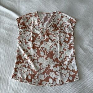 Beige V-Neck Blouse With White Floral Print